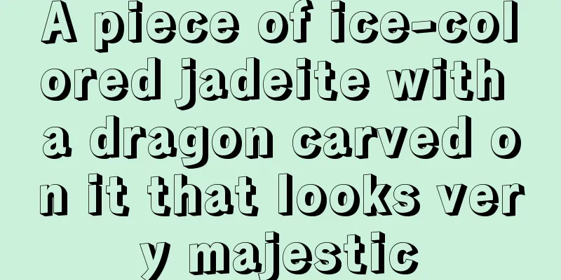 A piece of ice-colored jadeite with a dragon carved on it that looks very majestic